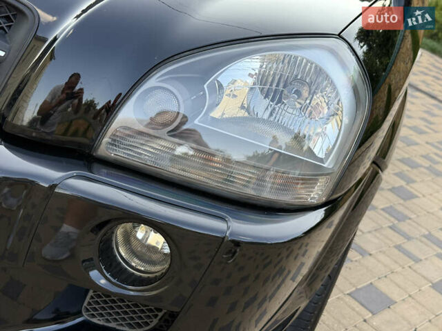 Чорний Хендай Туксон, об'ємом двигуна 1.98 л та пробігом 212 тис. км за 8200 $, фото 49 на Automoto.ua