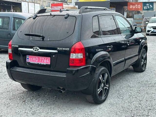 Чорний Хендай Туксон, об'ємом двигуна 2 л та пробігом 167 тис. км за 7950 $, фото 3 на Automoto.ua