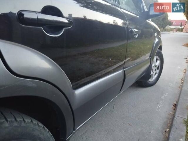 Чорний Хендай Туксон, об'ємом двигуна 1.99 л та пробігом 239 тис. км за 6990 $, фото 8 на Automoto.ua