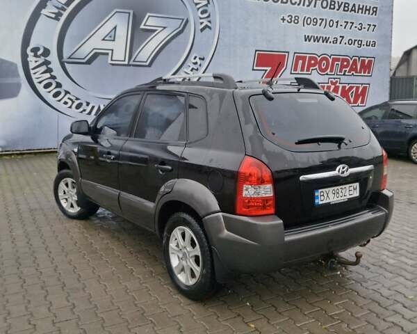 Чорний Хендай Туксон, об'ємом двигуна 2 л та пробігом 270 тис. км за 7500 $, фото 4 на Automoto.ua