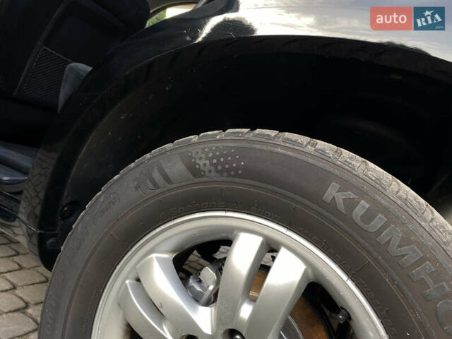 Чорний Хендай Туксон, об'ємом двигуна 1.98 л та пробігом 233 тис. км за 7650 $, фото 73 на Automoto.ua