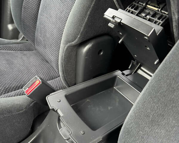 Черный Хендай Туксон, объемом двигателя 2 л и пробегом 201 тыс. км за 7750 $, фото 42 на Automoto.ua