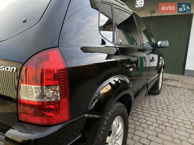 Чорний Хендай Туксон, об'ємом двигуна 1.98 л та пробігом 233 тис. км за 7650 $, фото 19 на Automoto.ua