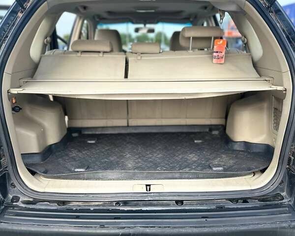 Черный Хендай Туксон, объемом двигателя 1.98 л и пробегом 277 тыс. км за 5350 $, фото 9 на Automoto.ua