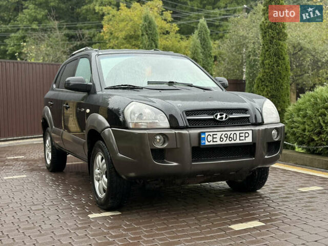 Черный Хендай Туксон, объемом двигателя 2 л и пробегом 256 тыс. км за 7450 $, фото 2 на Automoto.ua