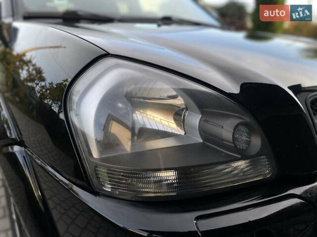 Чорний Хендай Туксон, об'ємом двигуна 1.98 л та пробігом 233 тис. км за 7650 $, фото 23 на Automoto.ua