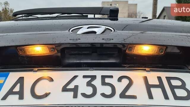 Черный Хендай Туксон, объемом двигателя 1.98 л и пробегом 277 тыс. км за 5350 $, фото 22 на Automoto.ua