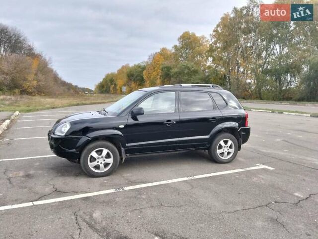 Черный Хендай Туксон, объемом двигателя 2 л и пробегом 127 тыс. км за 7590 $, фото 28 на Automoto.ua