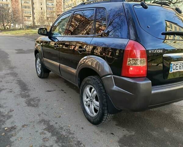 Черный Хендай Туксон, объемом двигателя 1.98 л и пробегом 256 тыс. км за 8000 $, фото 15 на Automoto.ua