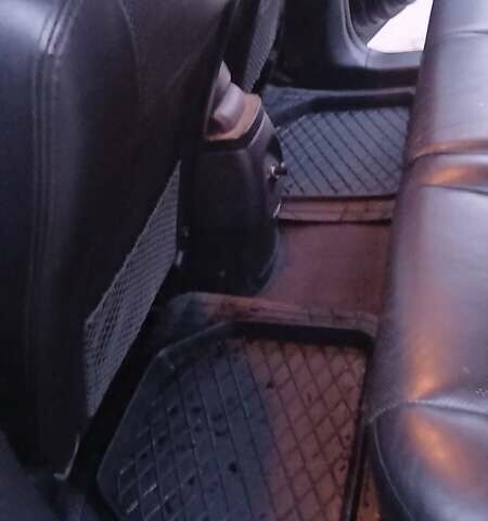 Черный Хендай Туксон, объемом двигателя 1.98 л и пробегом 320 тыс. км за 6300 $, фото 28 на Automoto.ua