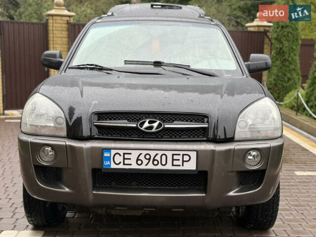 Черный Хендай Туксон, объемом двигателя 2 л и пробегом 256 тыс. км за 7450 $, фото 14 на Automoto.ua
