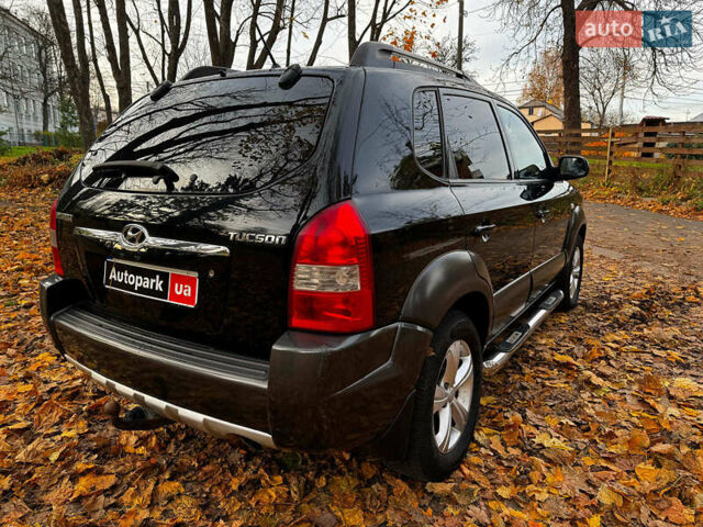 Черный Хендай Туксон, объемом двигателя 2 л и пробегом 210 тыс. км за 7990 $, фото 5 на Automoto.ua