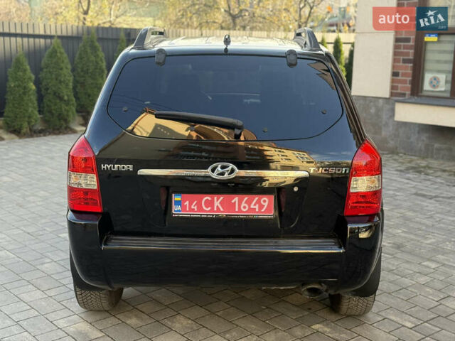 Черный Хендай Туксон, объемом двигателя 2 л и пробегом 249 тыс. км за 7450 $, фото 9 на Automoto.ua