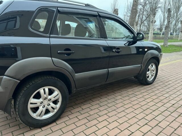 Черный Хендай Туксон, объемом двигателя 2 л и пробегом 220 тыс. км за 7200 $, фото 13 на Automoto.ua