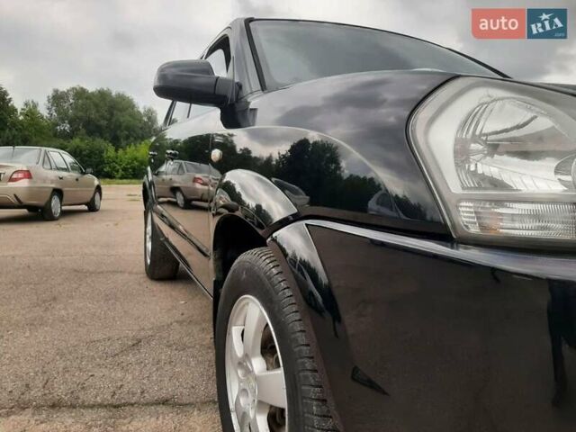 Черный Хендай Туксон, объемом двигателя 2 л и пробегом 216 тыс. км за 7600 $, фото 9 на Automoto.ua