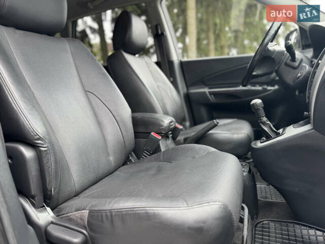 Черный Хендай Туксон, объемом двигателя 2 л и пробегом 187 тыс. км за 7550 $, фото 27 на Automoto.ua