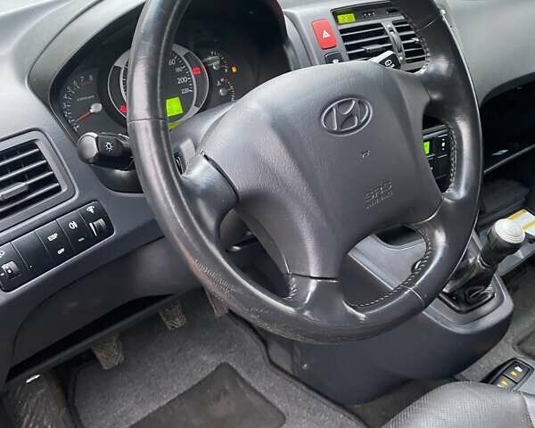 Чорний Хендай Туксон, об'ємом двигуна 1.98 л та пробігом 202 тис. км за 7350 $, фото 20 на Automoto.ua