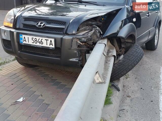 Черный Хендай Туксон, объемом двигателя 2.7 л и пробегом 275 тыс. км за 5500 $, фото 1 на Automoto.ua