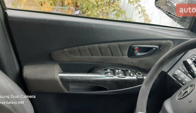 Чорний Хендай Туксон, об'ємом двигуна 1.99 л та пробігом 243 тис. км за 8850 $, фото 11 на Automoto.ua