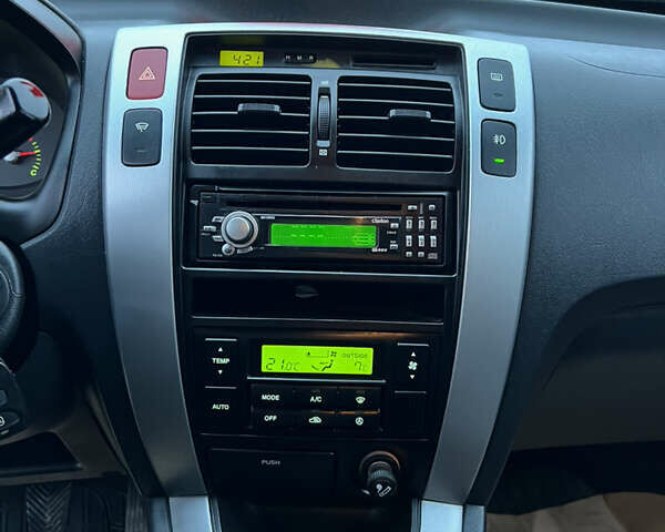 Чорний Хендай Туксон, об'ємом двигуна 1.98 л та пробігом 170 тис. км за 6999 $, фото 40 на Automoto.ua