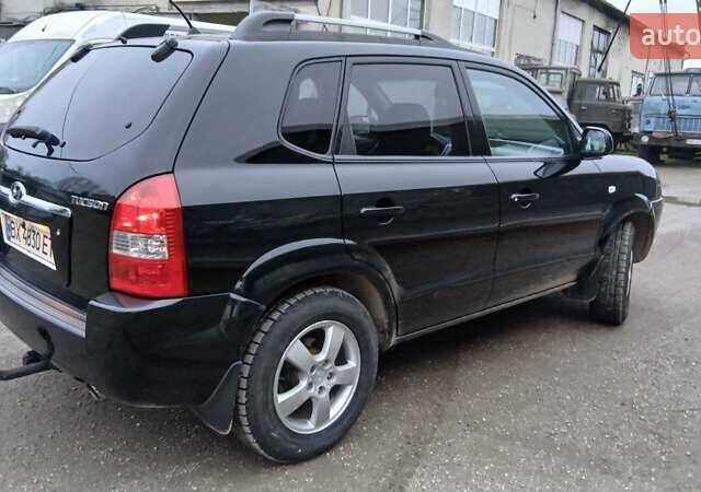 Чорний Хендай Туксон, об'ємом двигуна 1.98 л та пробігом 320 тис. км за 6500 $, фото 6 на Automoto.ua