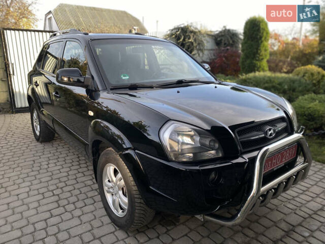 Чорний Хендай Туксон, об'ємом двигуна 1.98 л та пробігом 233 тис. км за 7650 $, фото 9 на Automoto.ua