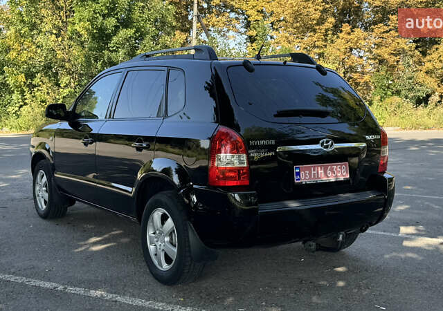 Черный Хендай Туксон, объемом двигателя 2 л и пробегом 266 тыс. км за 7000 $, фото 5 на Automoto.ua