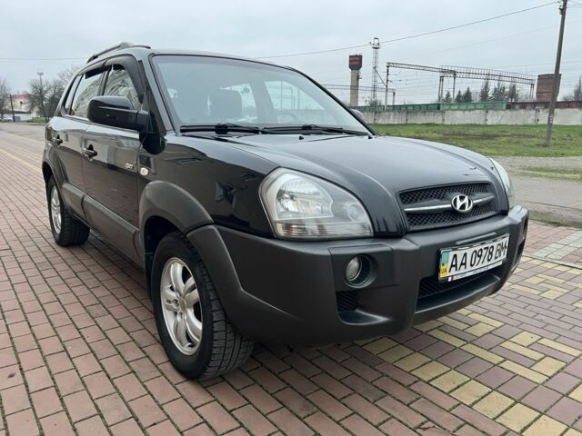 Черный Хендай Туксон, объемом двигателя 2 л и пробегом 220 тыс. км за 7200 $, фото 3 на Automoto.ua