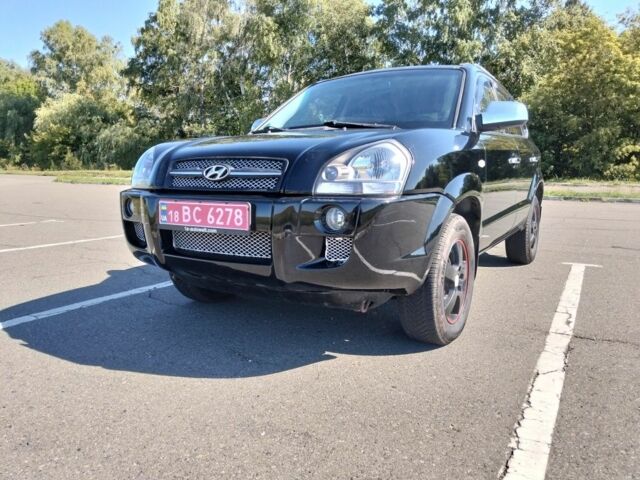 Чорний Хендай Туксон, об'ємом двигуна 2 л та пробігом 184 тис. км за 7690 $, фото 2 на Automoto.ua