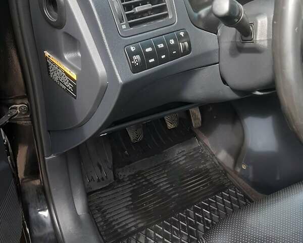 Черный Хендай Туксон, объемом двигателя 2 л и пробегом 280 тыс. км за 7400 $, фото 22 на Automoto.ua