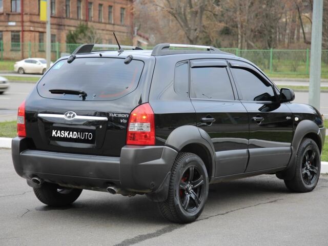Черный Хендай Туксон, объемом двигателя 2.7 л и пробегом 217 тыс. км за 8600 $, фото 5 на Automoto.ua