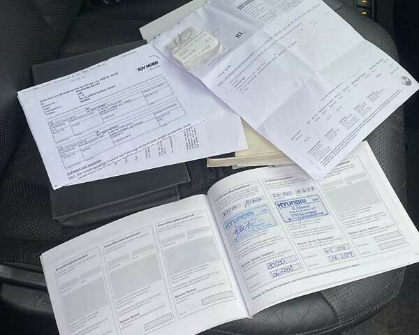 Чорний Хендай Туксон, об'ємом двигуна 1.98 л та пробігом 202 тис. км за 7350 $, фото 30 на Automoto.ua