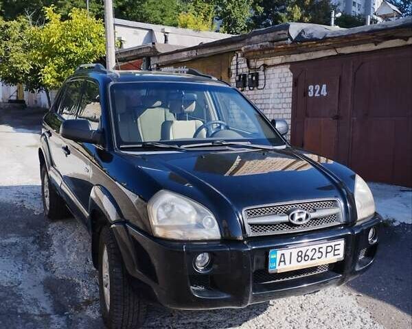 Черный Хендай Туксон, объемом двигателя 1.98 л и пробегом 190 тыс. км за 7800 $, фото 9 на Automoto.ua