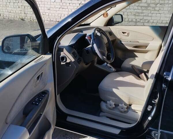 Черный Хендай Туксон, объемом двигателя 1.98 л и пробегом 190 тыс. км за 7800 $, фото 8 на Automoto.ua