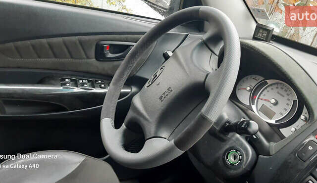 Чорний Хендай Туксон, об'ємом двигуна 1.99 л та пробігом 243 тис. км за 8850 $, фото 13 на Automoto.ua