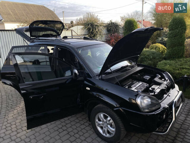 Чорний Хендай Туксон, об'ємом двигуна 1.98 л та пробігом 233 тис. км за 7650 $, фото 70 на Automoto.ua