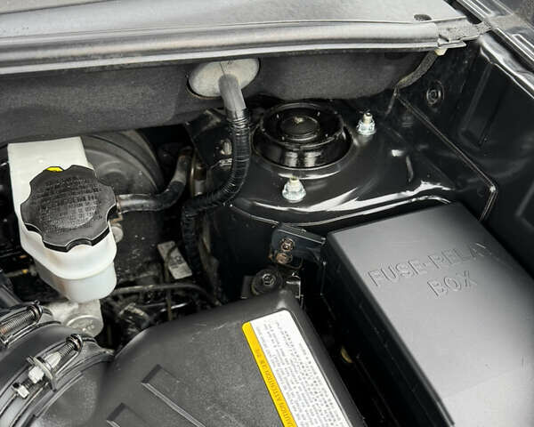 Черный Хендай Туксон, объемом двигателя 2 л и пробегом 201 тыс. км за 7750 $, фото 30 на Automoto.ua