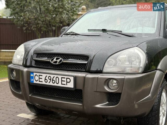 Черный Хендай Туксон, объемом двигателя 2 л и пробегом 256 тыс. км за 7450 $, фото 13 на Automoto.ua