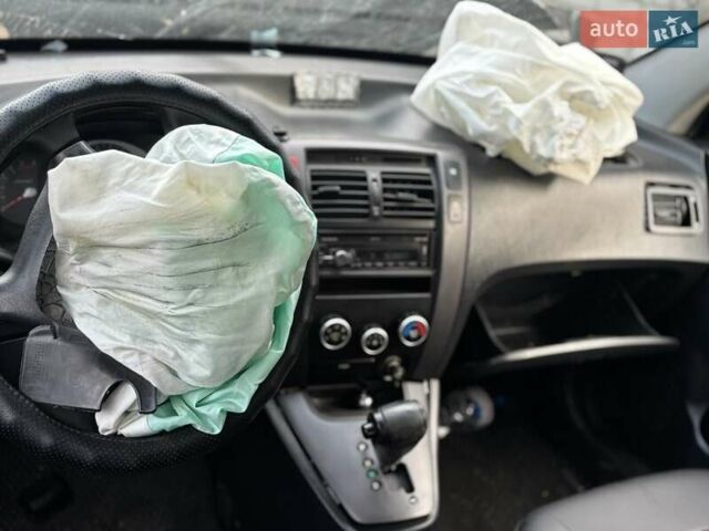 Чорний Хендай Туксон, об'ємом двигуна 1.99 л та пробігом 250 тис. км за 2000 $, фото 4 на Automoto.ua