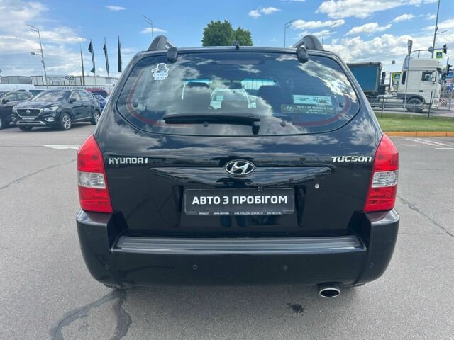 Чорний Хендай Туксон, об'ємом двигуна 2 л та пробігом 306 тис. км за 6900 $, фото 4 на Automoto.ua