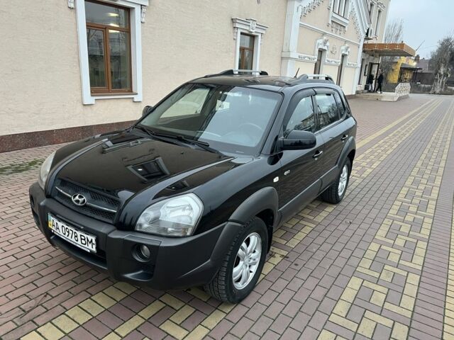 Черный Хендай Туксон, объемом двигателя 2 л и пробегом 220 тыс. км за 7200 $, фото 6 на Automoto.ua