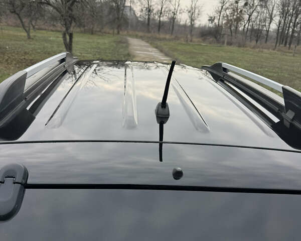 Черный Хендай Туксон, объемом двигателя 2 л и пробегом 201 тыс. км за 7750 $, фото 13 на Automoto.ua