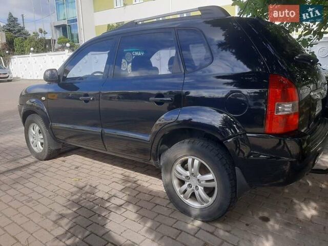 Черный Хендай Туксон, объемом двигателя 2 л и пробегом 280 тыс. км за 7400 $, фото 8 на Automoto.ua