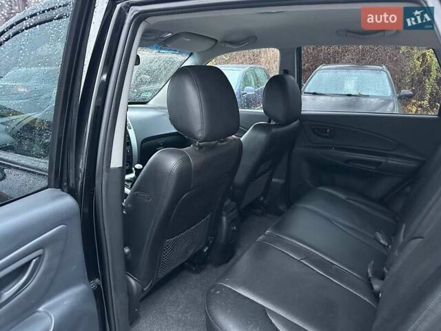 Чорний Хендай Туксон, об'ємом двигуна 2 л та пробігом 167 тис. км за 7950 $, фото 9 на Automoto.ua