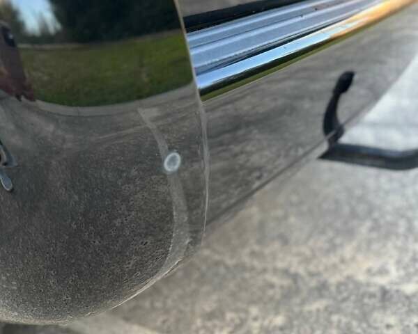 Черный Хендай Туксон, объемом двигателя 2 л и пробегом 235 тыс. км за 6700 $, фото 10 на Automoto.ua