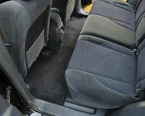 Чорний Хендай Туксон, об'ємом двигуна 2 л та пробігом 271 тис. км за 6599 $, фото 11 на Automoto.ua