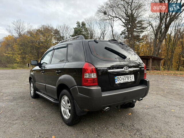 Хендай Туксон 2006 у Тернополі на Automoto.ua Чорний Хендай Туксон, об'ємом двигуна 1.99 л та пробігом 240 тис. км за 7600 $, фото 13 на Automoto.ua
