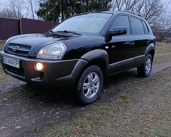 Черный Хендай Туксон, объемом двигателя 1.98 л и пробегом 253 тыс. км за 7600 $, фото 20 на Automoto.ua