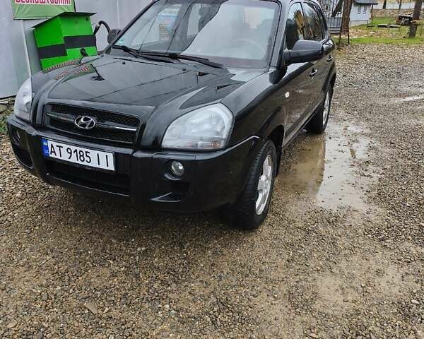 Чорний Хендай Туксон, об'ємом двигуна 2 л та пробігом 271 тис. км за 6599 $, фото 1 на Automoto.ua