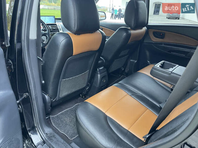 Черный Хендай Туксон, объемом двигателя 2 л и пробегом 216 тыс. км за 7500 $, фото 22 на Automoto.ua